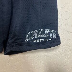 Alphalete mesh lined shirts in black elastic waist size medium